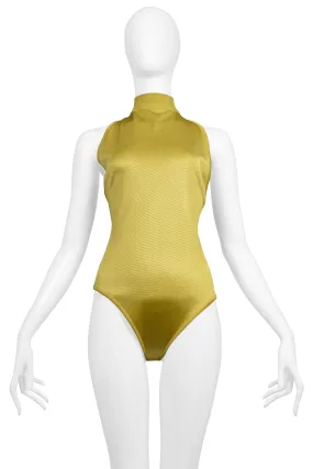 ALAIA GOLD BODYSUIT WITH BUTTON UP BACK