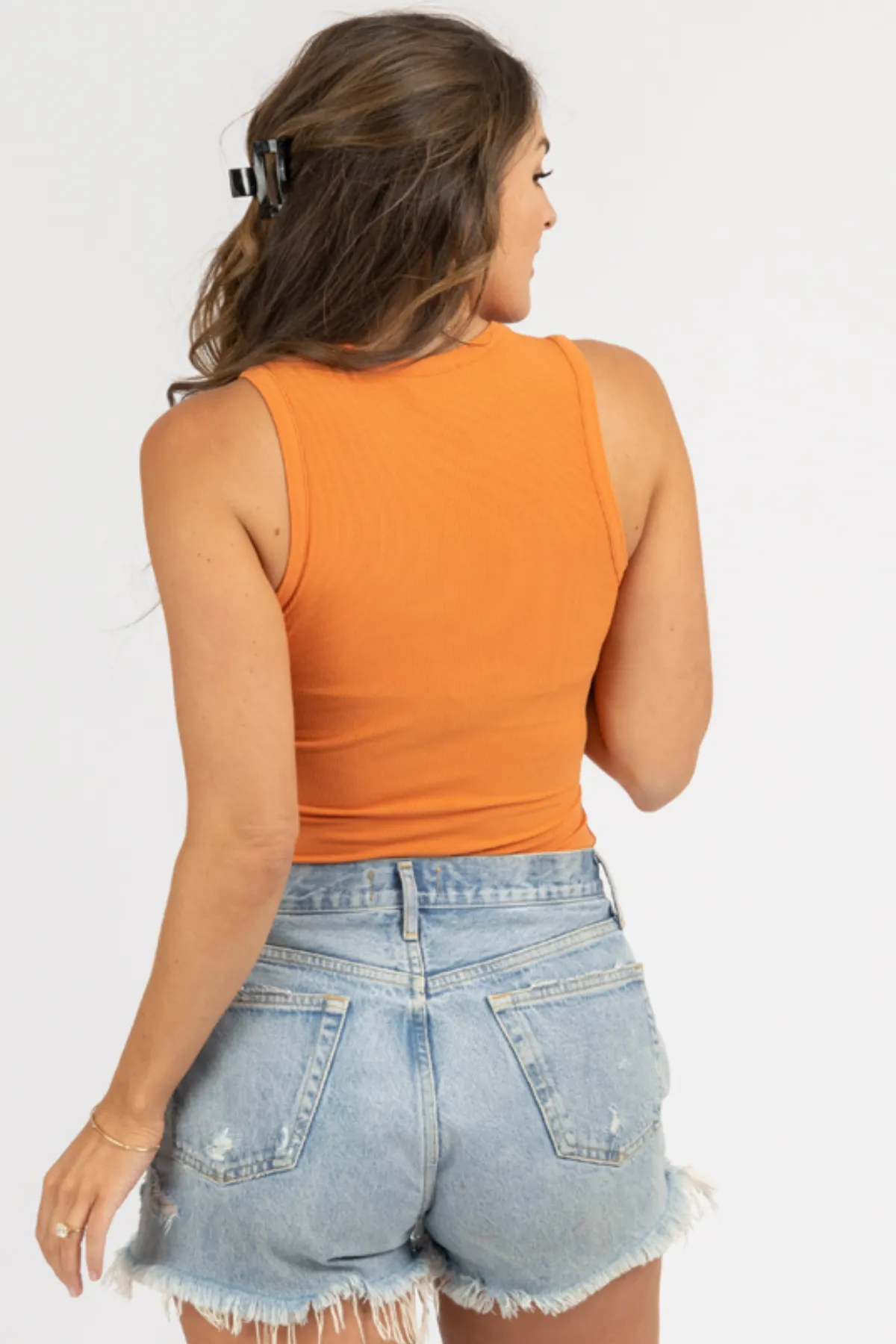 ROUND NECK SLEEVELESS BODYSUIT IN ORANGE